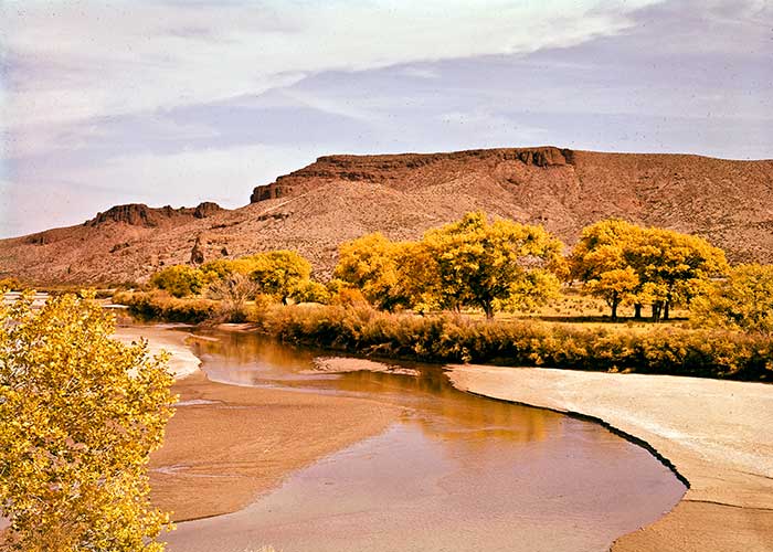 The Rio Grande River with low level of water flowing